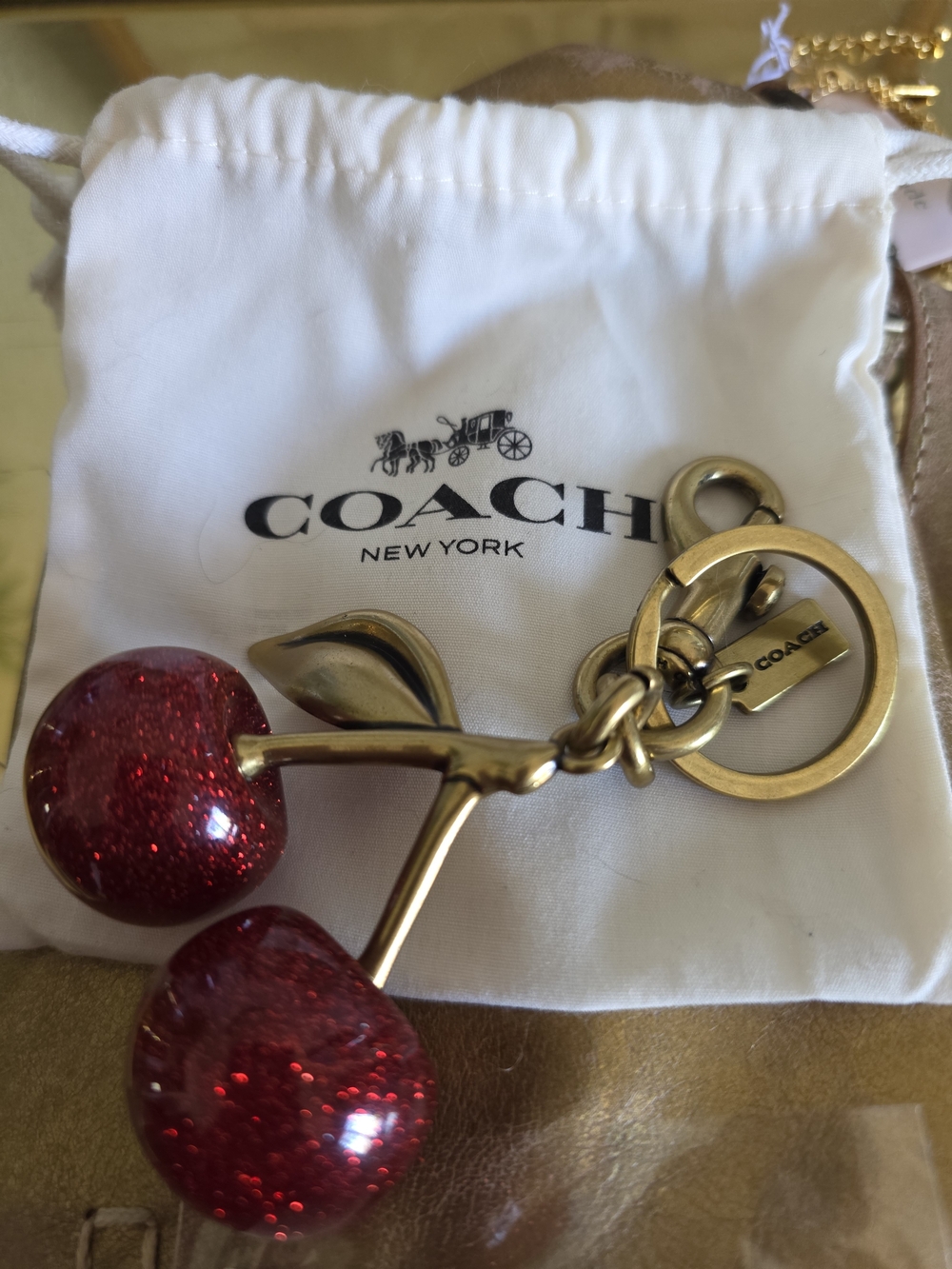 COACH Red Glitter Cherry Keychain with Gold Hardware